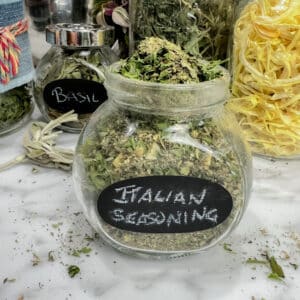 jar labelled Italian seasoning filled with dried herbs and spices