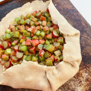 folding pastry over rhubarb