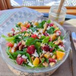 blood orange salad on plate by window